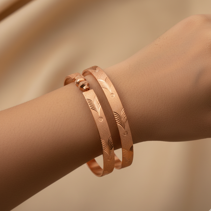 Pair of Golden Bangles with Engraved Design