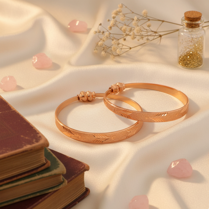 Pair of Golden Bangles with Engraved Design