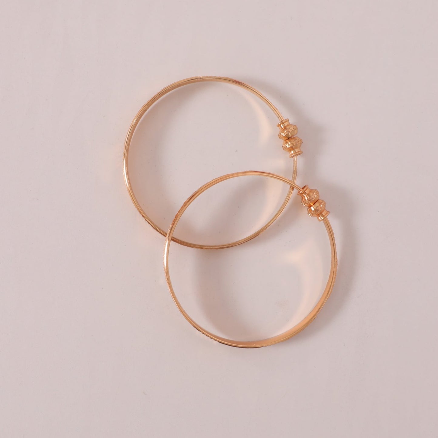 Pair of Golden Bangles with Engraved Design